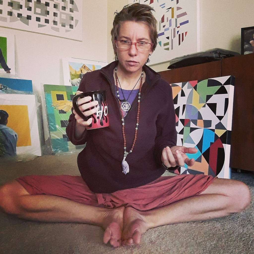 relativelylocal.com Nicole Jaquis, sitting on the floor as usual, yoga in the modern world
